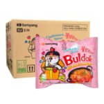 Samyang Buldak Carbonara ramen packet in front of its shipping carton showing case configuration
